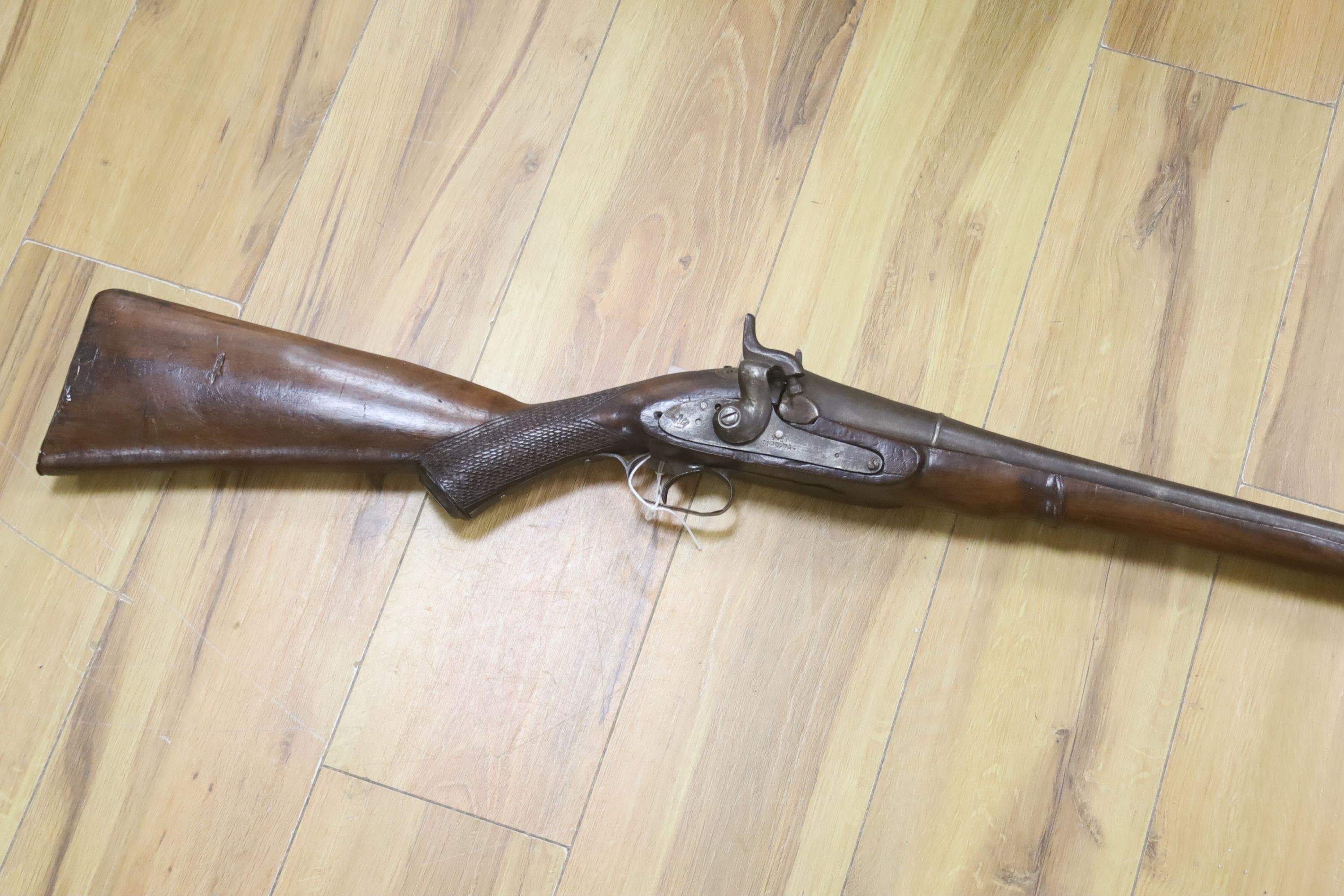 A 19th century percussion musket with walnut stock and ramrod, 158cm